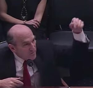 Elliott Abrams protests